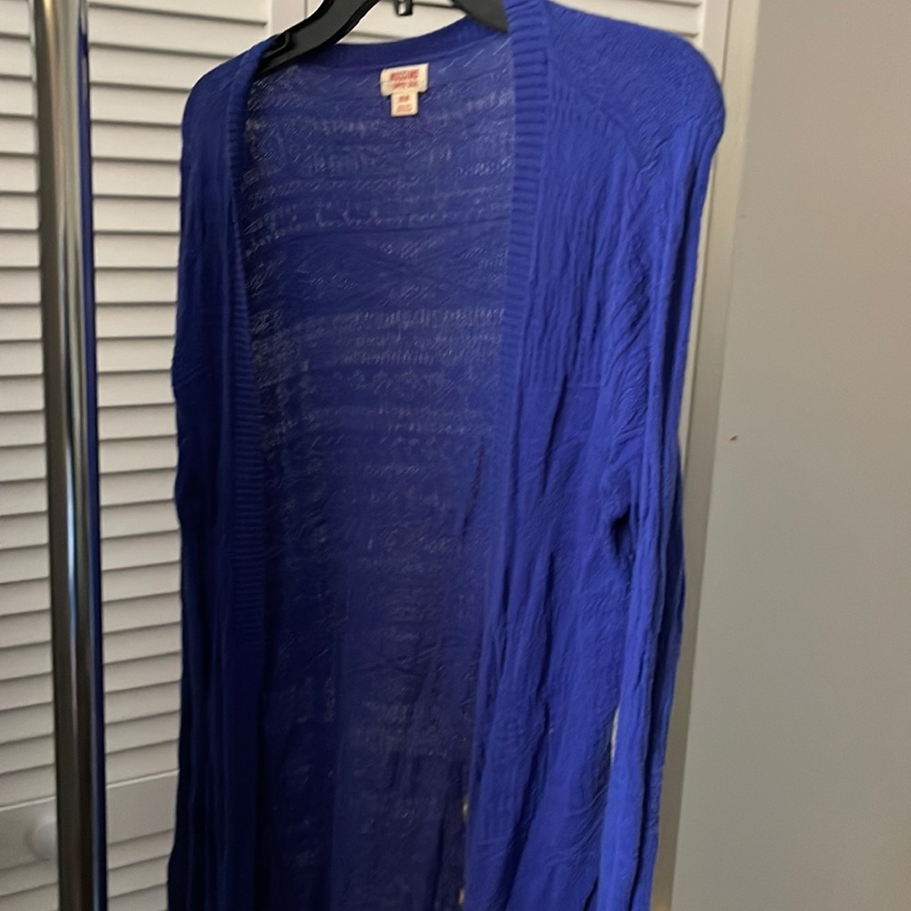 Deep blue/purple sweater.